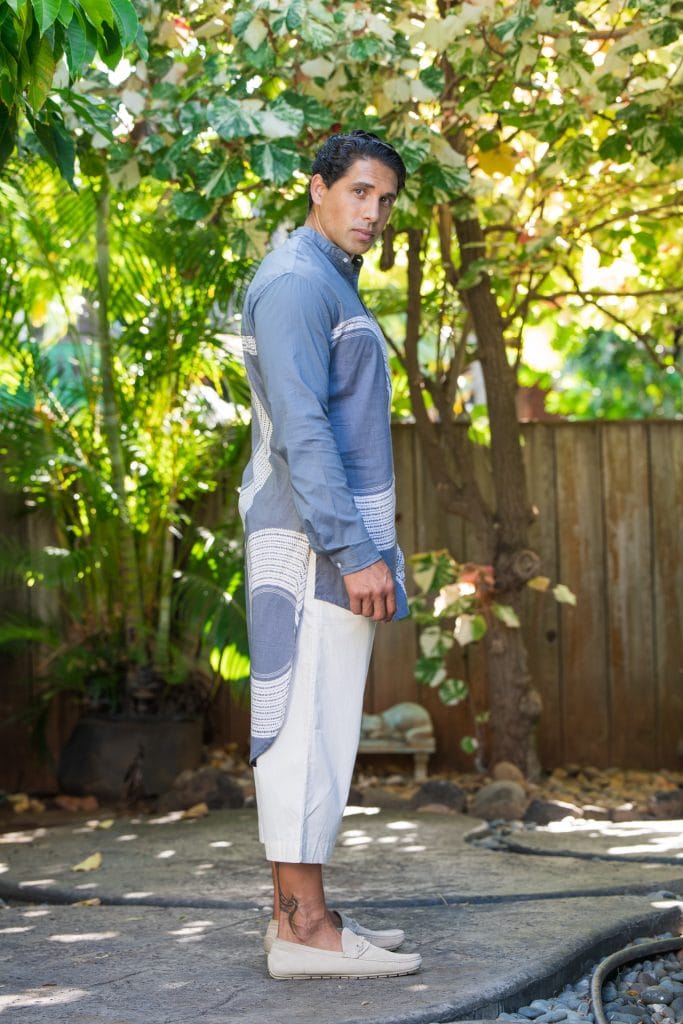 Male model wearing Mandarin Half Tunic in Pavement Moonbeam Poai Pattern - Side View