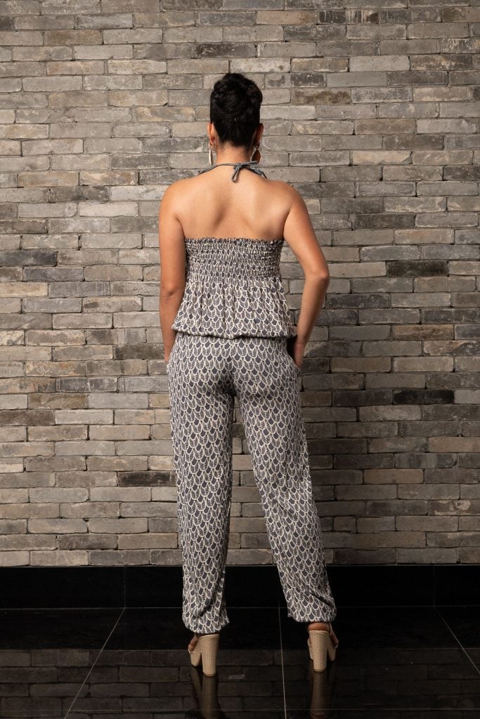 Model wearing Lei Jumpsuit in Pavement Moonbeam Palulu Pattern - Back View