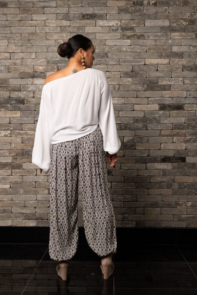 Model wearing Waioli Pant in Pavement Moonbeam Palulu Pattern - Back View