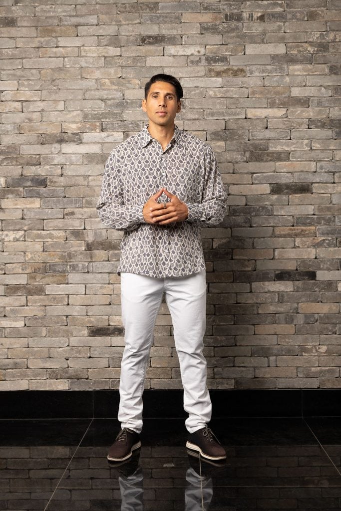 Male model wearing Hilo Shirt L-S in Pavement Moonbeam Palulu Pattern - Front View