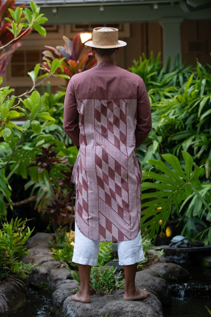 Male Model wearing Mandarin Half Tunic in Fired Brick White Kamehameha Pattern - Back View