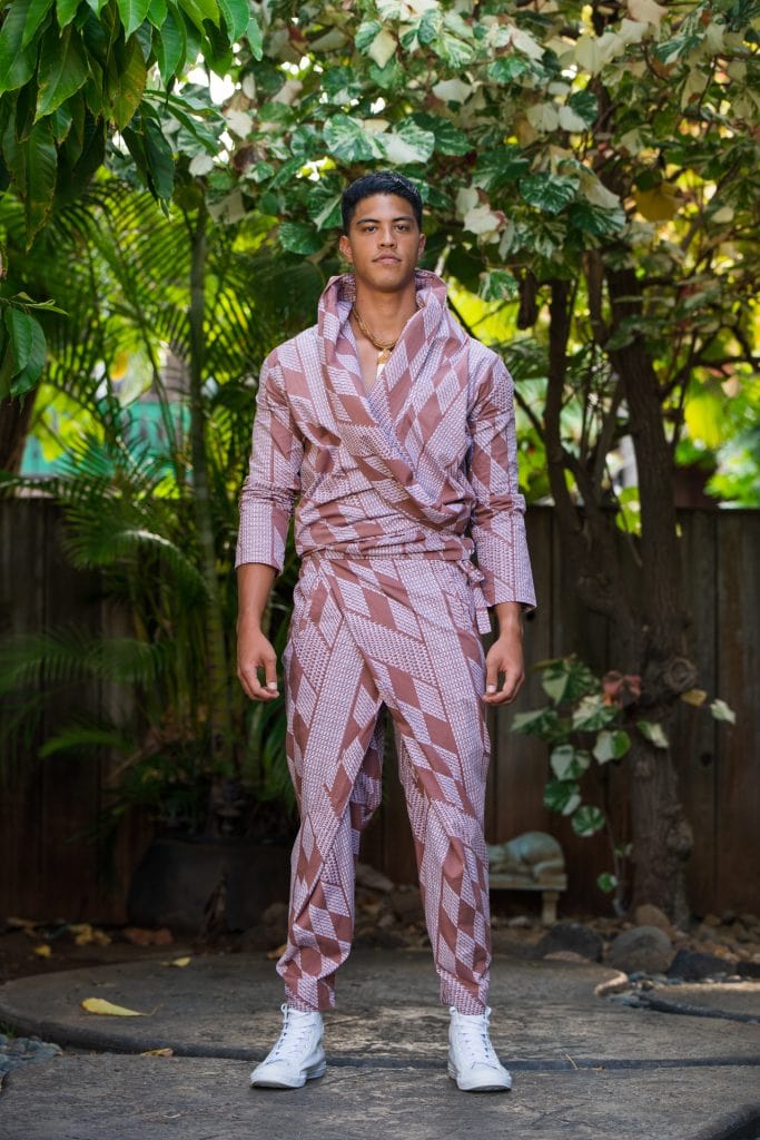 Male model wearing Mohala Jacket in Fired Brick White Kamehahema Pattern - Front View