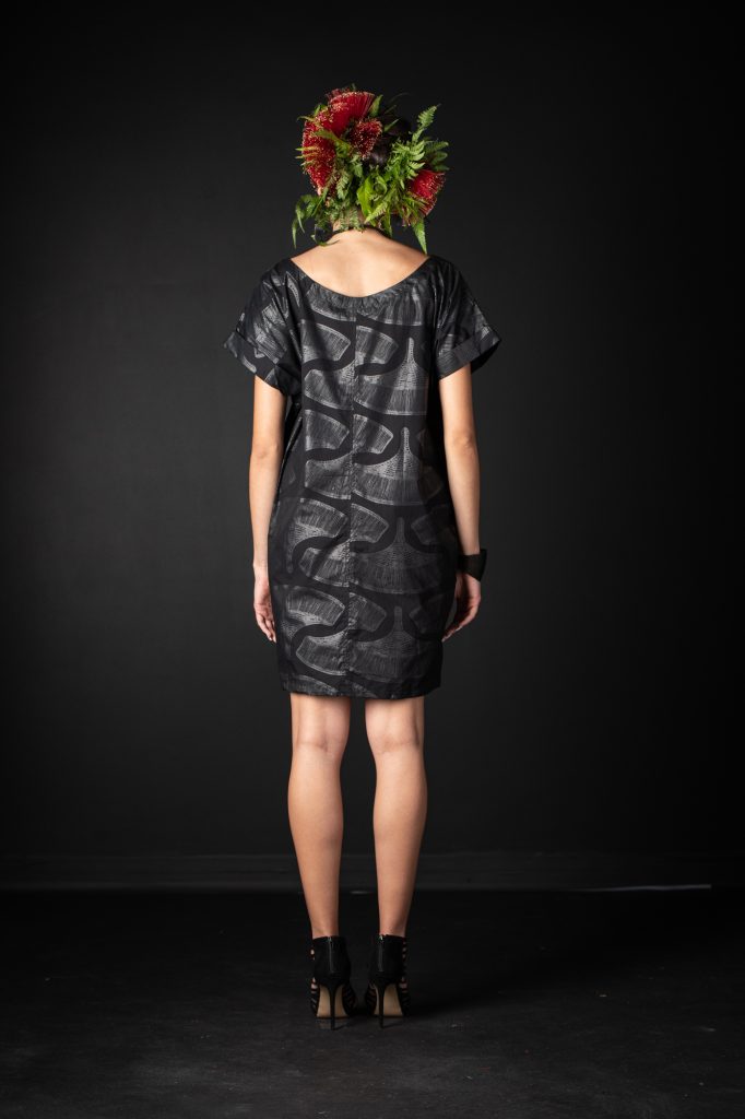 Model wearing Puaniu Dress - Back View