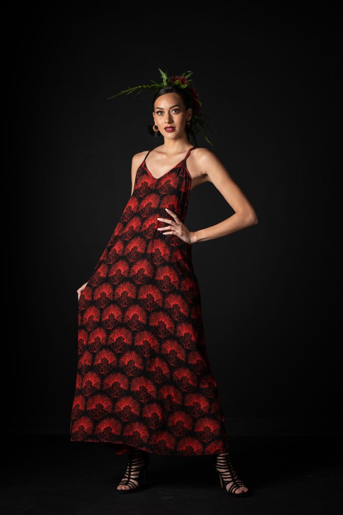 Model wearing Lanihau Dress in Black Fiery Red Kalihilehua Pattern- Front View
