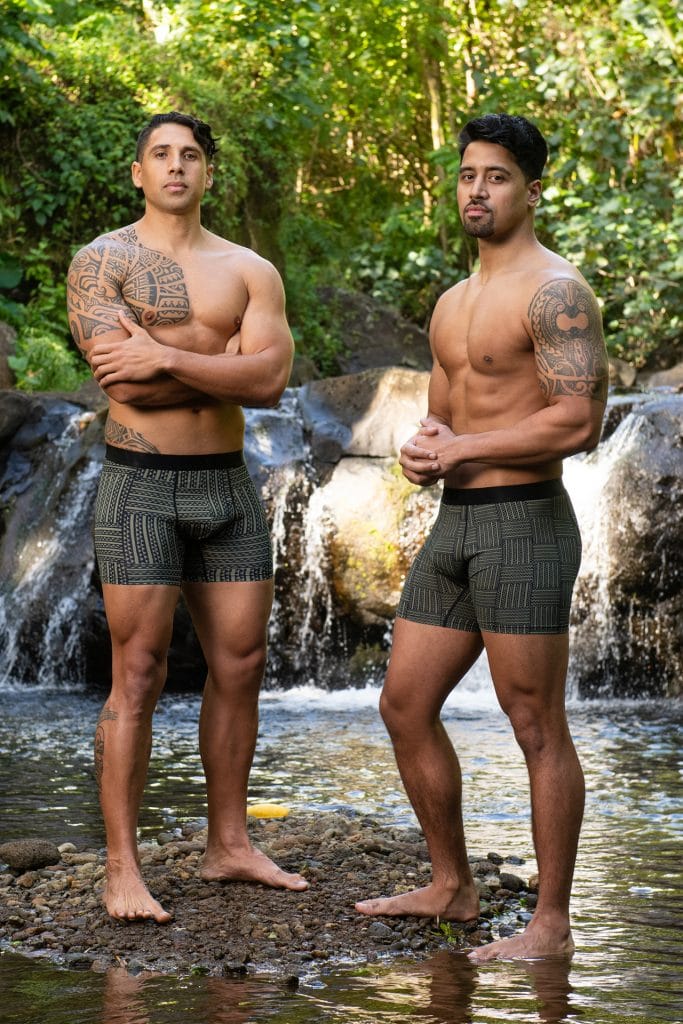 Two male models wearing Manaola Boxer Trunk in Martini Olive-Jet Black Ulana Pattern - Front View