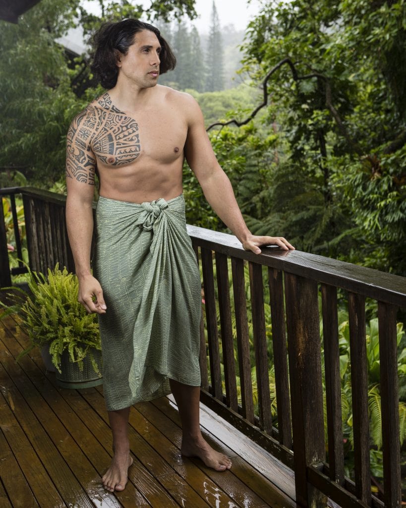 Male model wearing Pareo wrap in Lily Pad Margarita Kupukupu pattern