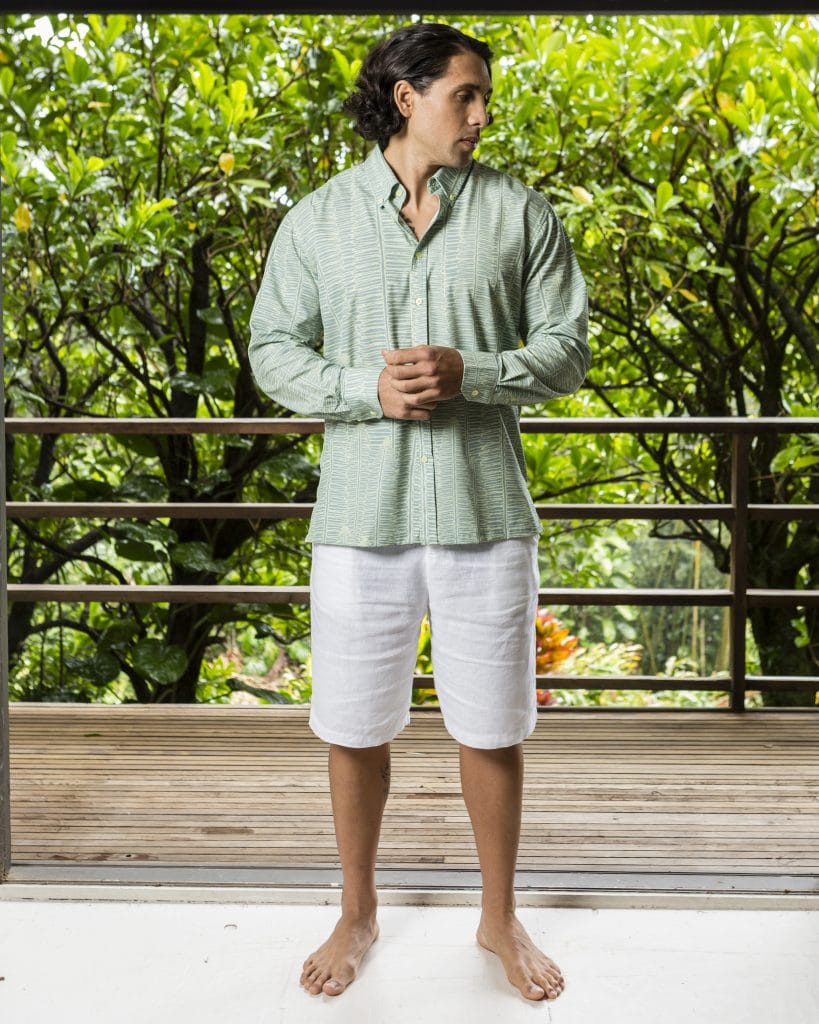 Male Model wearing Mahalo Shirt in Lily Pad Margarita Kupukupu Pattern Back View