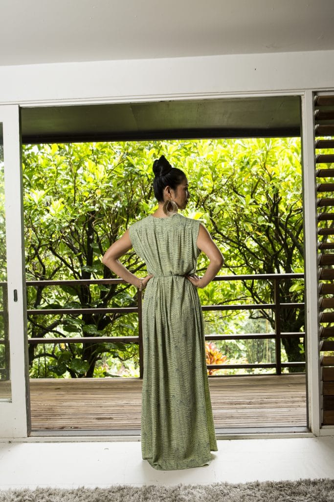 Model wearing Alena Long Dress in Margarita Lily Pad Kupukupu Pattern back view