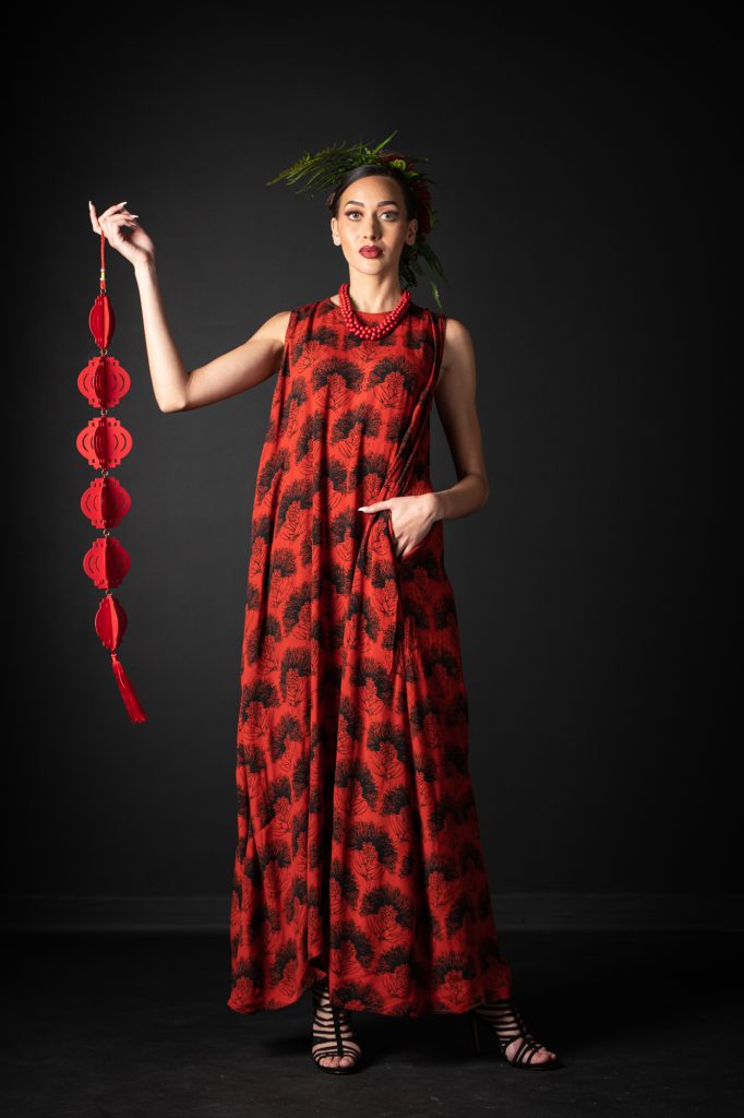 Model wearing Malia Long Dress in Firey Red-Black Kalihilehua Pattern- Front View