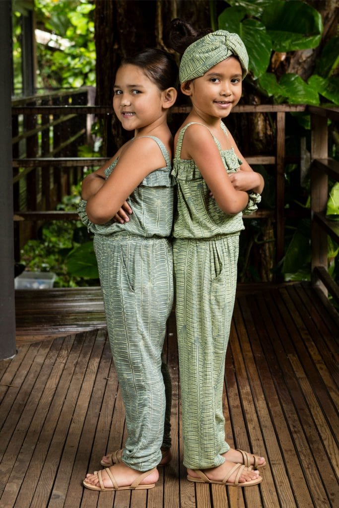 Two girls wearing Top Penny top and Alakai Jogger in Lily Pad Margarita Kupukupu pattern