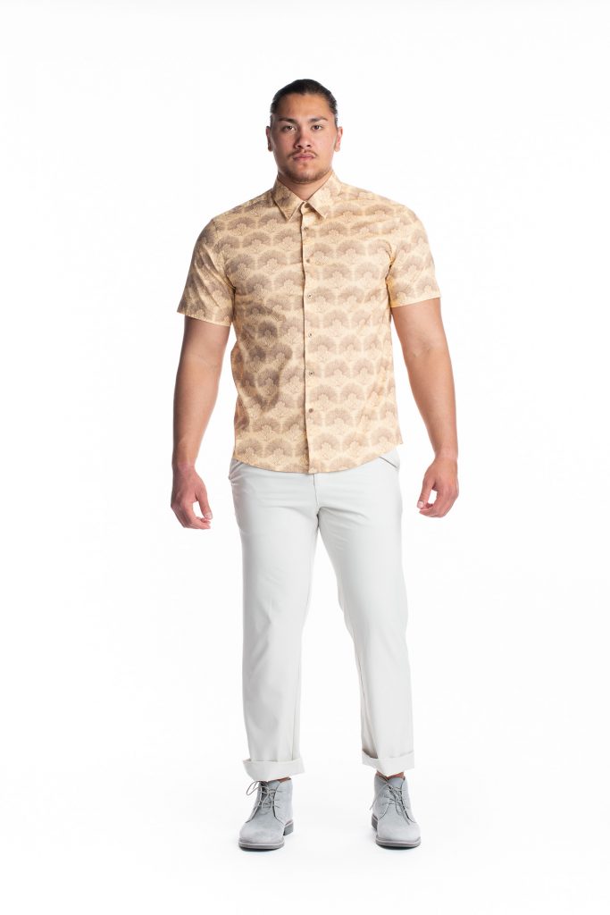 Male model wearing Aloha Short Sleeve in Apricot Sherbert/Gingersnap Kalihilehua - Front View