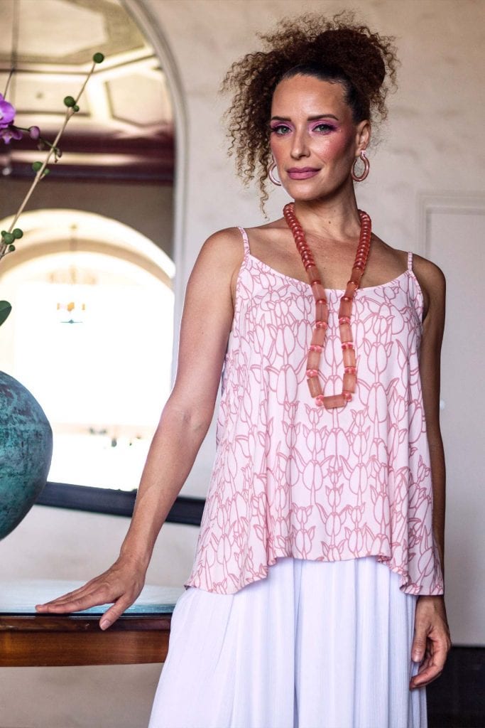 Female model wearing Manaola Top 6 - Front View