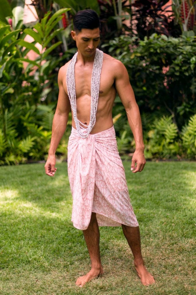 Male Model wearing Pareo in a Kapualiko and Ash Rose-Lotus Color - Front View