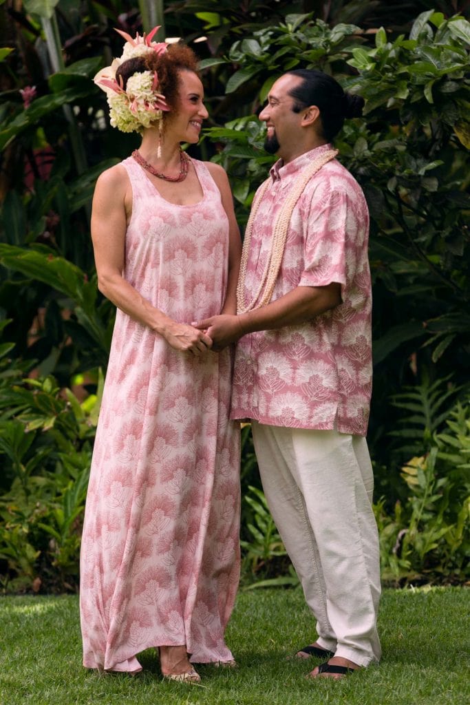 Male Model wearing Aloha Short Sleeve Shirt and Female Model Wearing Dress both in Fired Brick-White