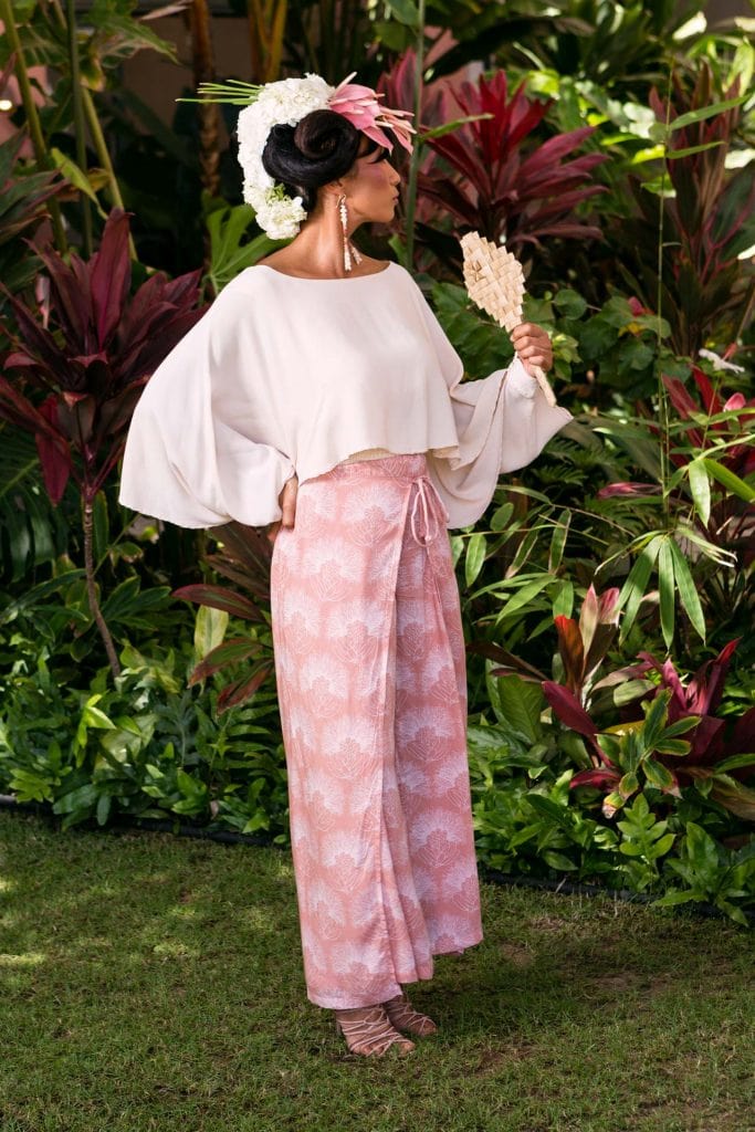Female model wearing a Pant Kai Malino Wrap in Ash Rose and Lotus - Side View