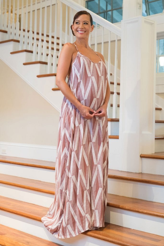 Female model wearing Keahou Dress in Kanaola and Fired Brick-White - Front View