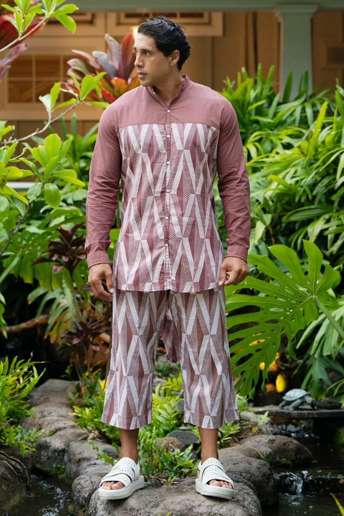 Male model wearing Kyoto Shorts in a Kanaloa Pattern and Fired Brick-White - Front View
