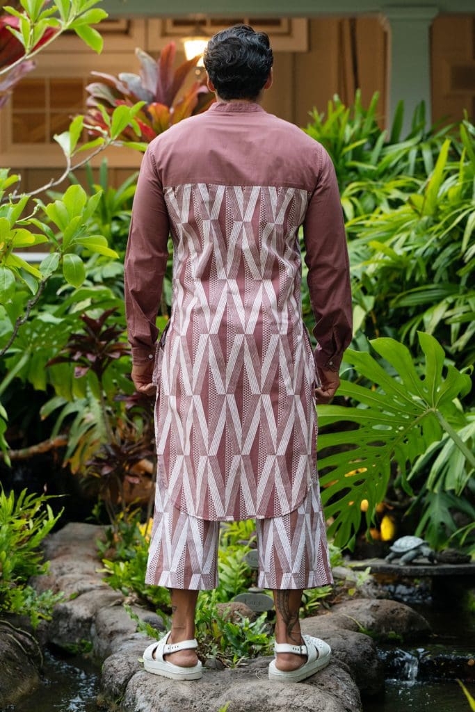 Male model wearing Mandarin Half Tunic in a Kanaloa Pattern and Fired Brick-White - Back View