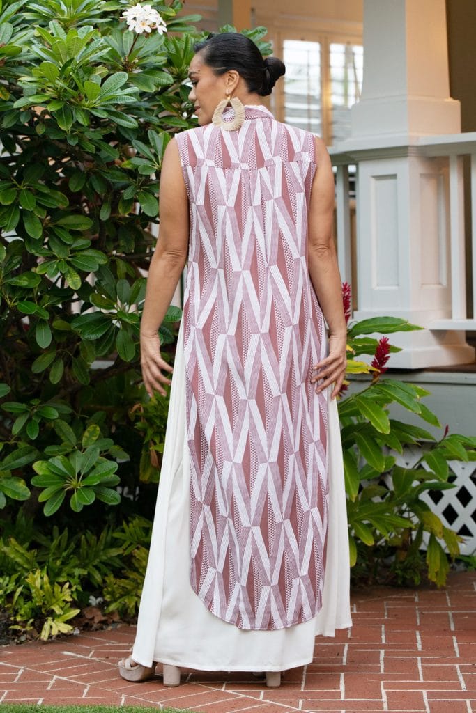 Female Model wearing a Hualalai Top in a Kanaloa Pattern and Fired Brick-White - Back View