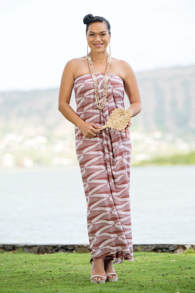Female model wearing Pareo in a Kanaloa Pattern and Fired Brick-White Color - Front View