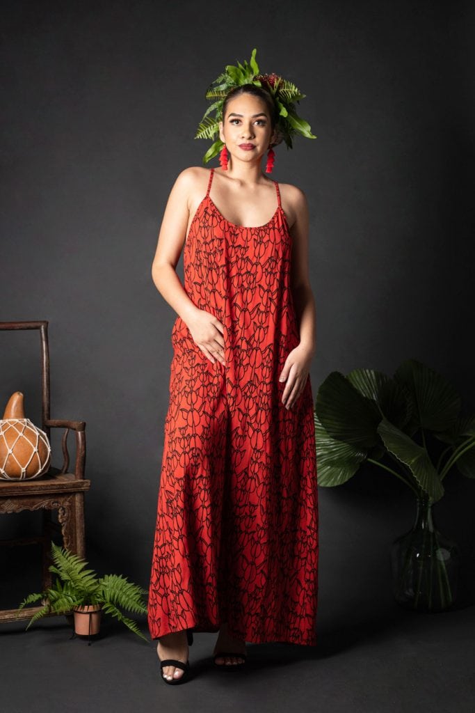 Female model wearing Keahou Dress in a Kapualiko Fiery Red/Black Color - Front View