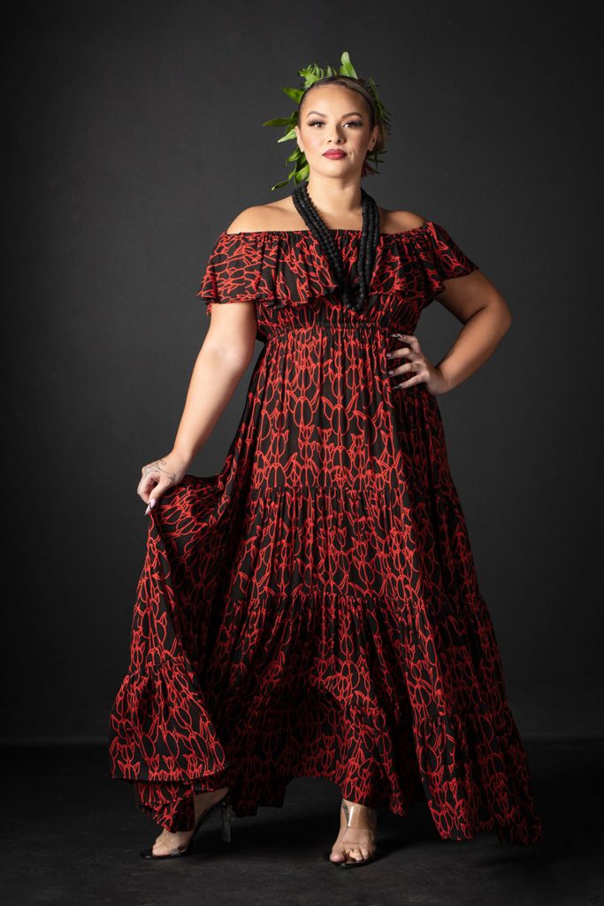 Female model wearing Lauae Maxi Dress in a Kapualiko Pattern in Black-Fiery Red - Front View
