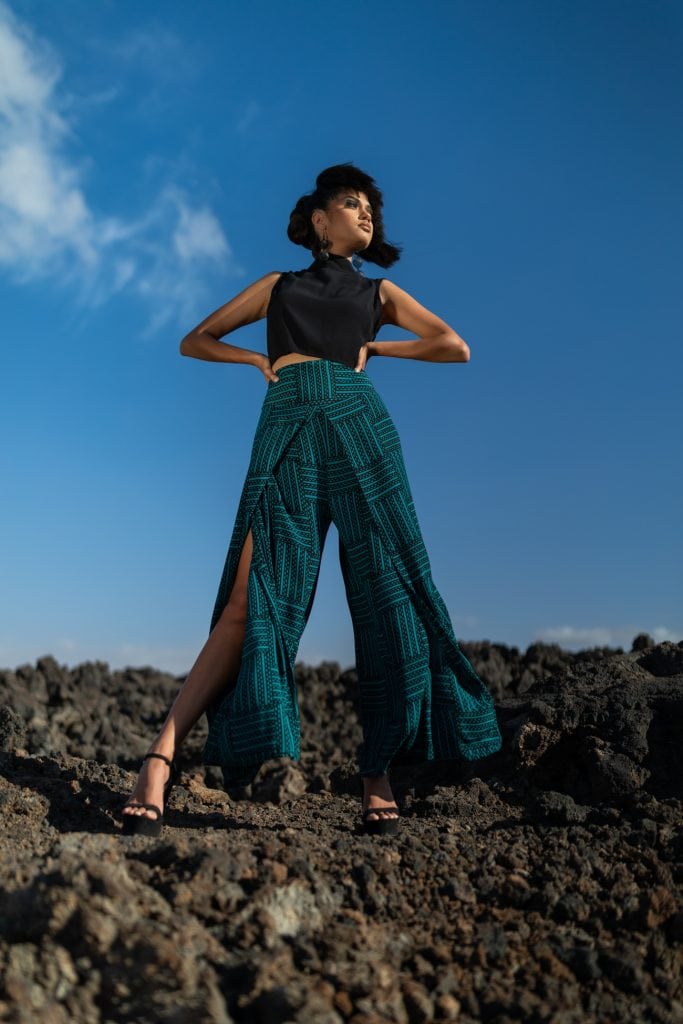 Female model wearing Kainalu Pant in Dark Teal - Front View