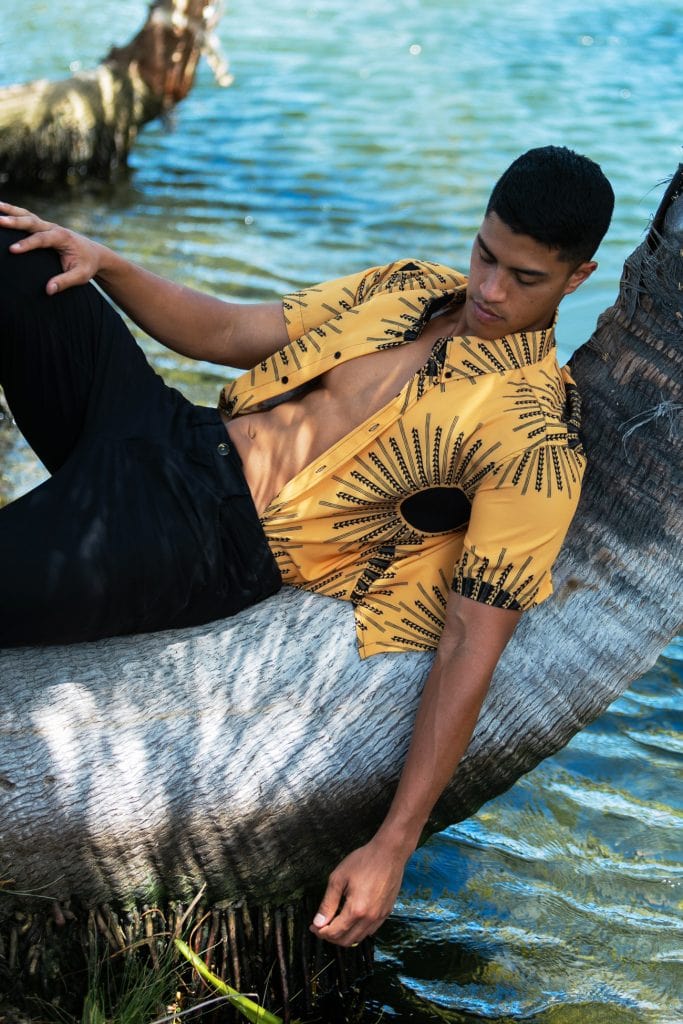 Male model wearing Mahalo Shirt in Kanehoalani Pattern in Mustard - Front View