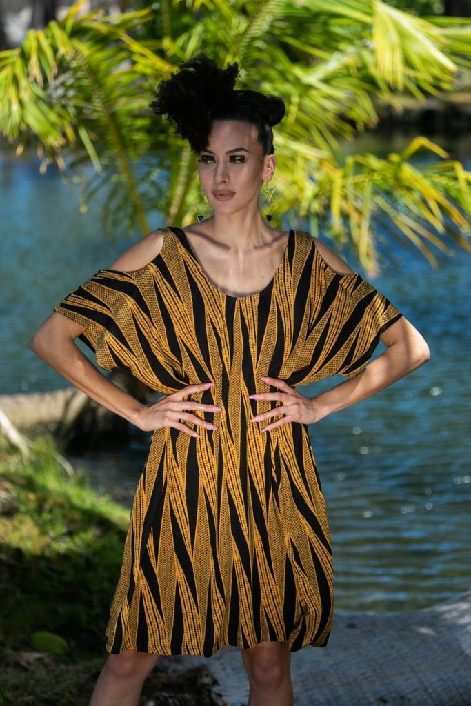 Female model wearing Holunape Dress in Kanehoalani Pattern - Front View
