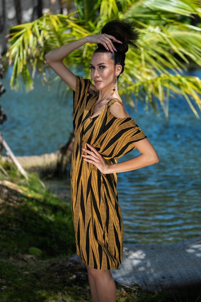 Female model wearing Holunape Dress in Kanehoalani Pattern - Front View