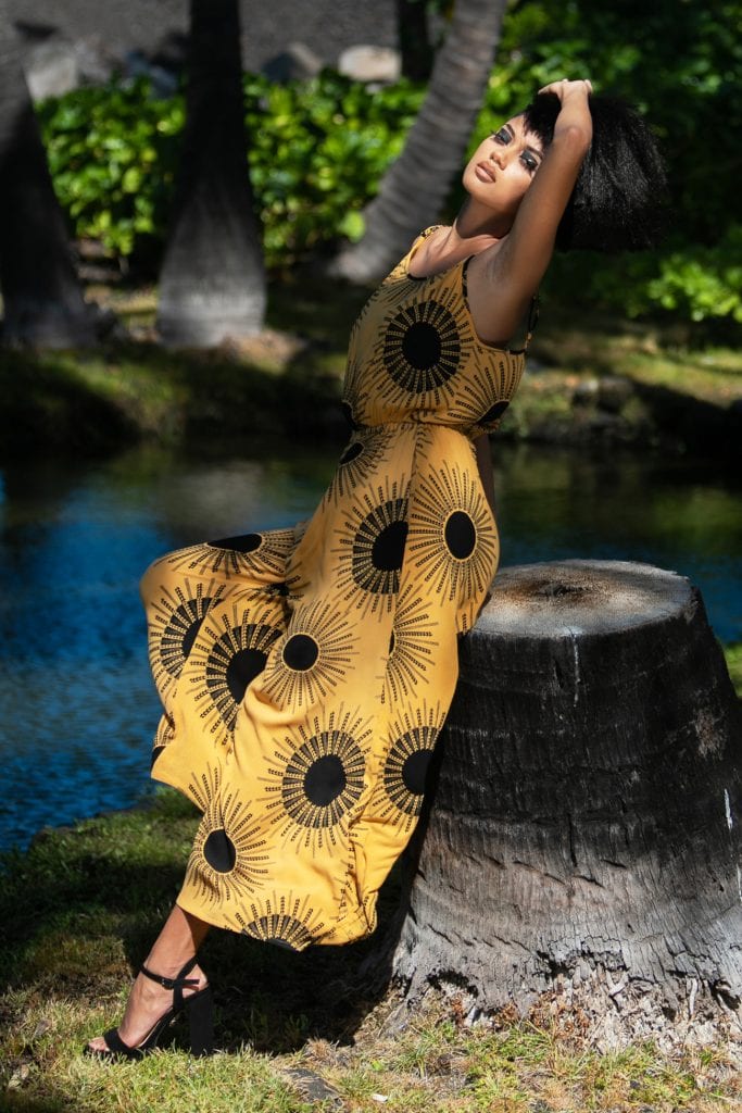 Female model wearing Leahi Jumpsuit in Kanehoalani Pattern - Front View