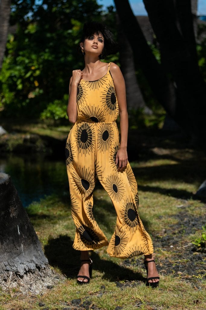 Female model wearing Leahi Jumpsuit in Kanehoalani Pattern - Front View