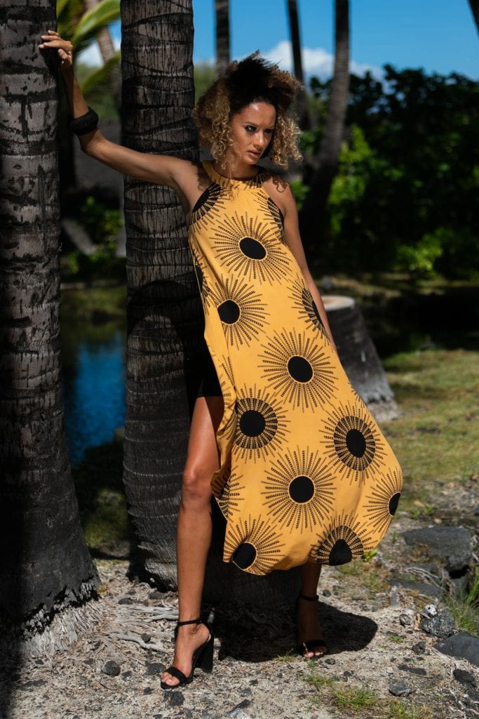 Female model wearing Kawehilani Dress in Kanehoalani Pattern - Front View