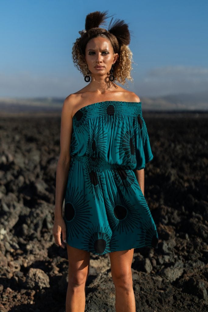 Female model wearing Oneka Short Dress in in Dragonfly/Black Color and Kanehoalani Pattern - Front View