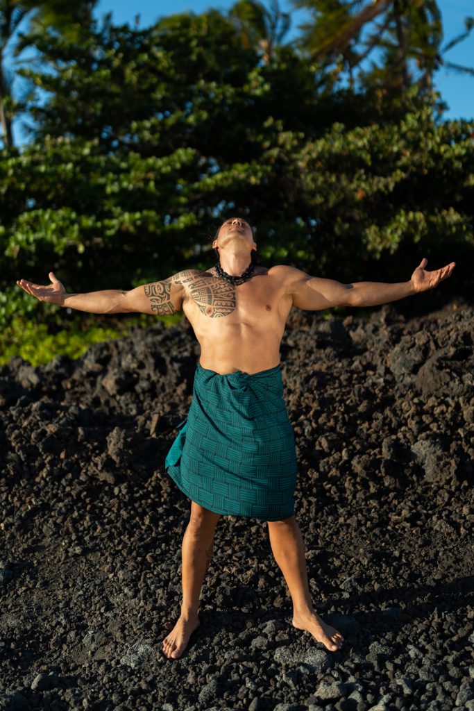 Male model wearing Small Ulana Pareo in Black/Teal - Front View