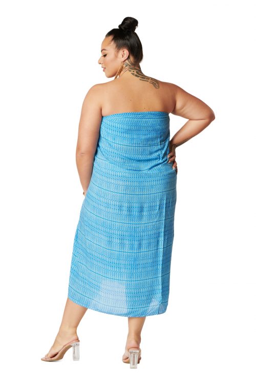Female model wearing a Pareo in Kapa print and Strong Blue-Petit Color - Back View