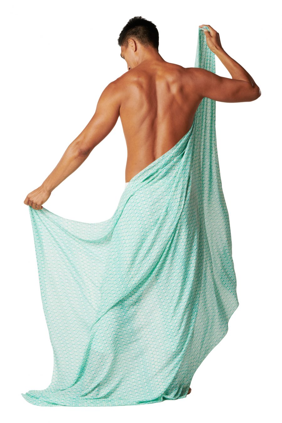 Male model wearing a Pareo in Kaimana print and Fair Aqua and Baltic Color - Back View