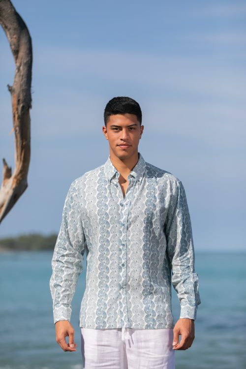 Male model wearing Aloha Long Sleeve in a Lei Kupee Print and Tofu/Real Teal Color - Front View