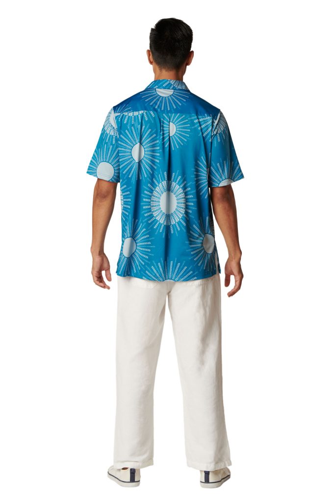 Male model wearing Aloha on the Green in Kanehoalani print and Seaport/Illusion Color - Back View