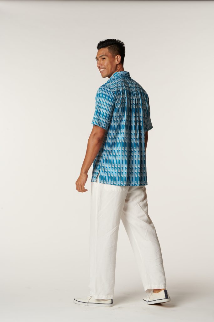 Male model wearing Aloha on the Green Pullover in Hulu Nene Print and Seaport Blue Color - Back View