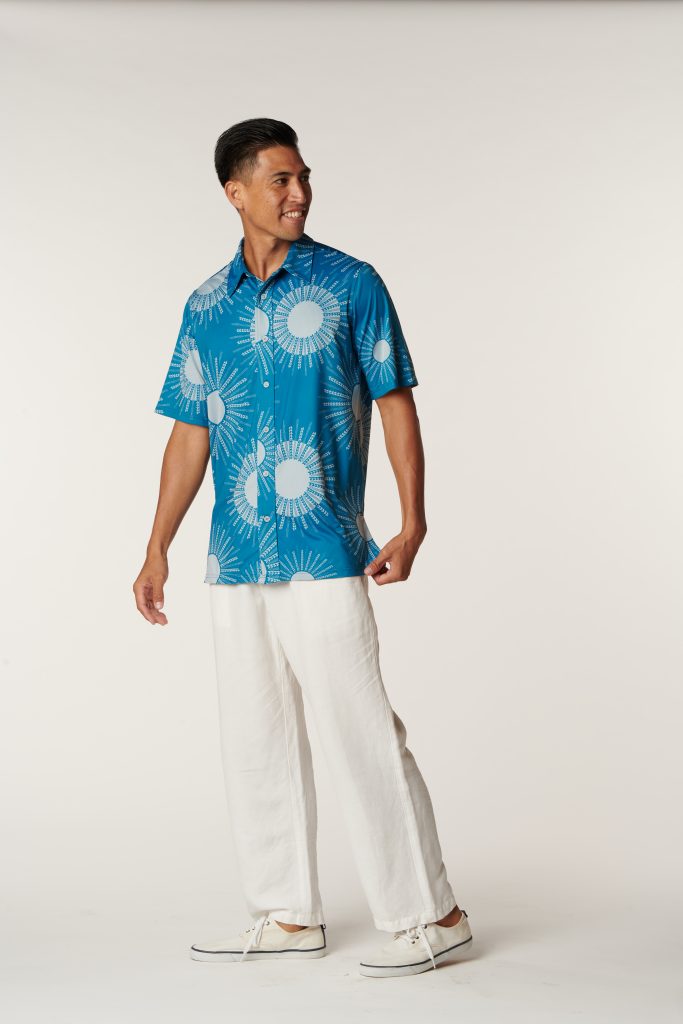 Male model wearing Aloha on The Green Pullover in a Kanehoalani Print and Seaport/Illusion Color - Front View