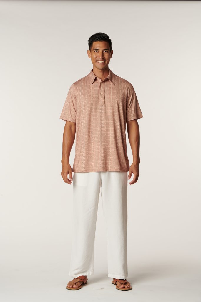 Male model wearing Aloha on The Green Pullover in a Kapa Print and Sandshell/Macaroon Color - Front View