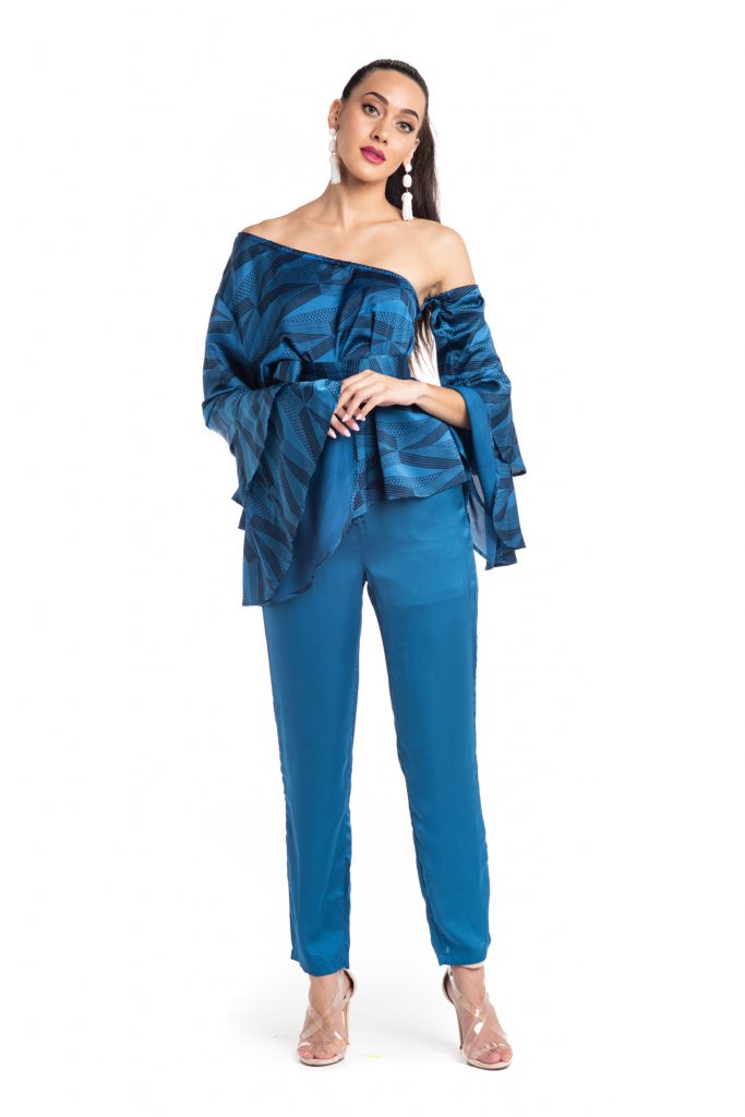 Female model wearing Uluhala Joggers in a Solid Print and Blue/Sapphire Color - Front View