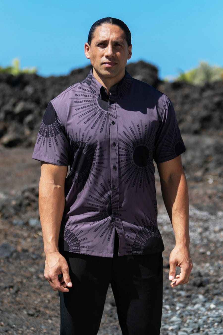 Male model wearing Mahalo Shirt S-S in Kaneholani pattern and Blackened Pearl-Black Color - Front View