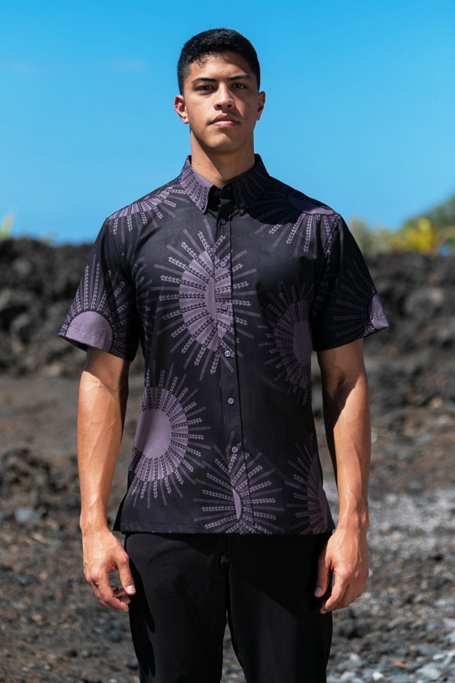 Male model wearing Mahalo Shirt S-S in Kaneholani pattern and Black-Blacked Pearl Color - Front View
