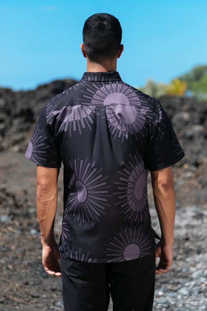 Male model wearing Mahalo Shirt S-S in Kaneholani pattern and Black-Blackened Pearl - Back View