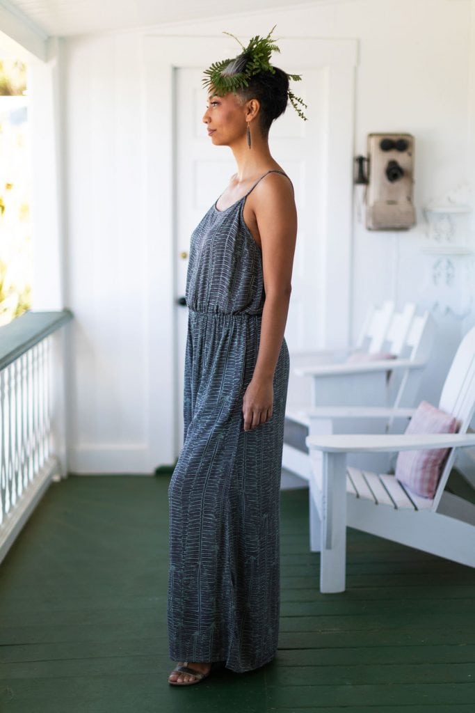 Female model wearing Leahi Jumpsuit - Side View