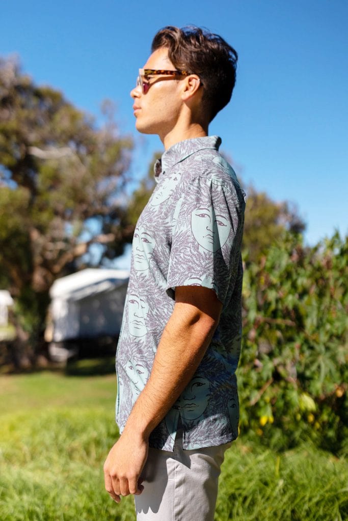 Male model wearing Mahalo SS in Laukapalili Pattern - Side View