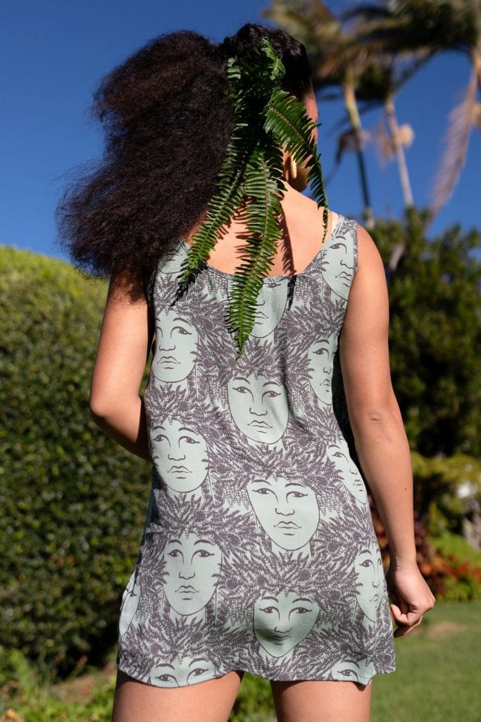 Female model wearing Malama Top - Back View