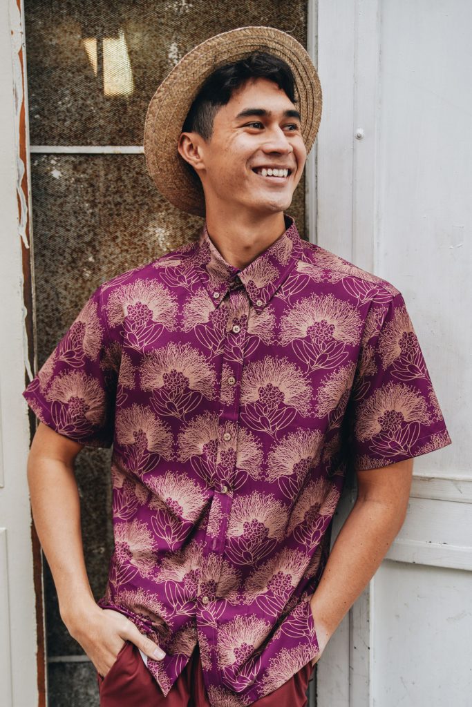 Male model wearing Mahalo Shirt S-S in Purple Potion-Lion, Kalihilehua Pattern